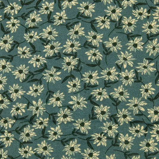 A close-up of a fabric or wallpaper pattern featuring a repeating design of small white daisy-like flowers with dark centers and stems on a muted teal-blue background.