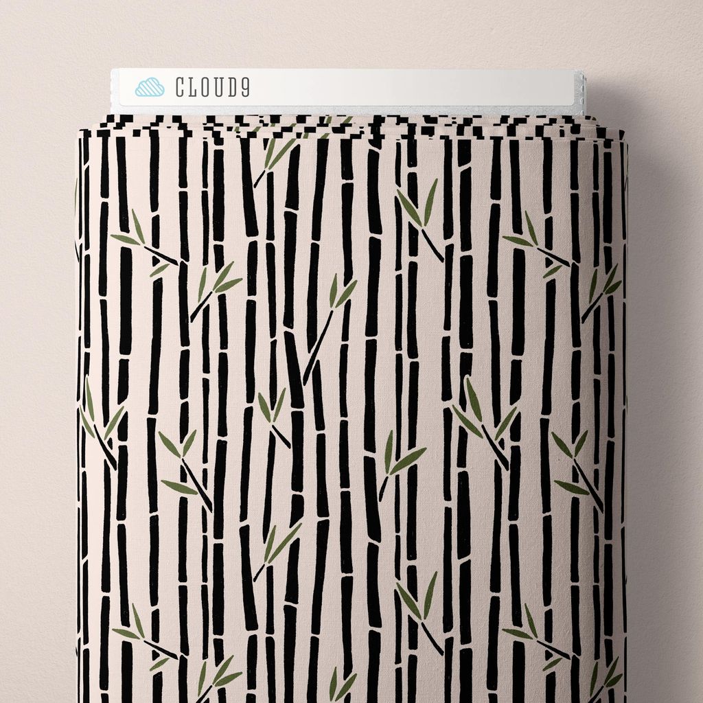 a bolt of fabric featuring sketched, hand-drawn bamboo stalks and leafy sprigs arranged in vertical rows across a cream background with olive green accents against a white background