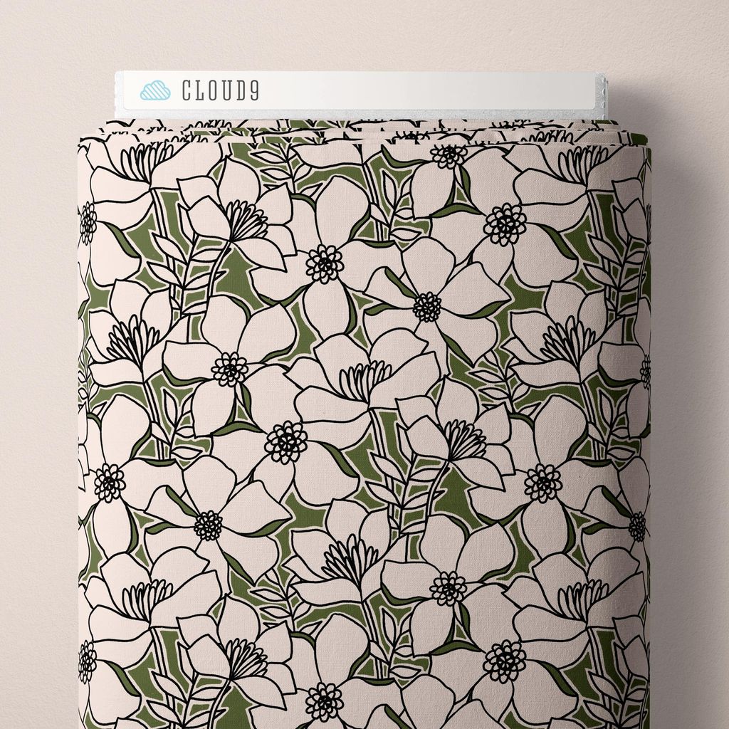 a bolt of fabric featuring sketched, hand-drawn blossoms and leafy sprigs layered across a cream background with olive green accents against a white background