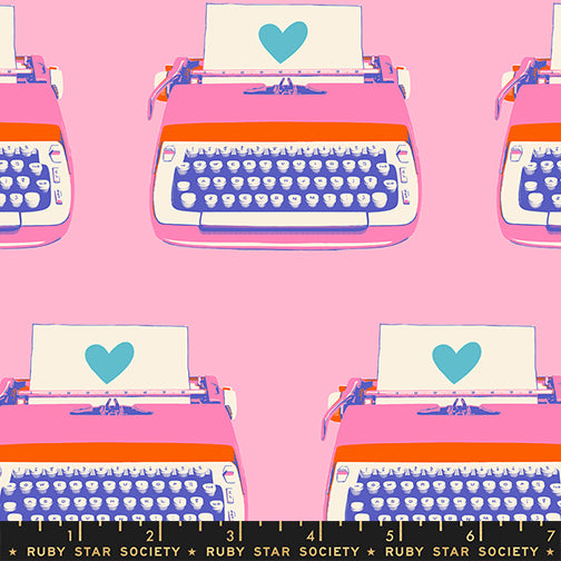 Pattern of pink typewriters with blue hearts on a pink background, featuring Ruby Star Society branding.