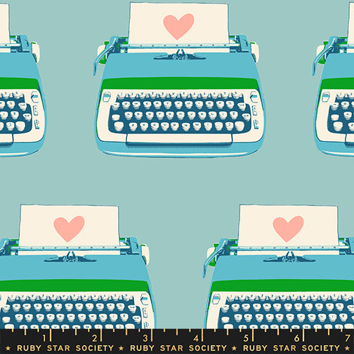 Pattern of typewriters with hearts on the screen against a light blue background, featuring the Ruby Star Society logo.