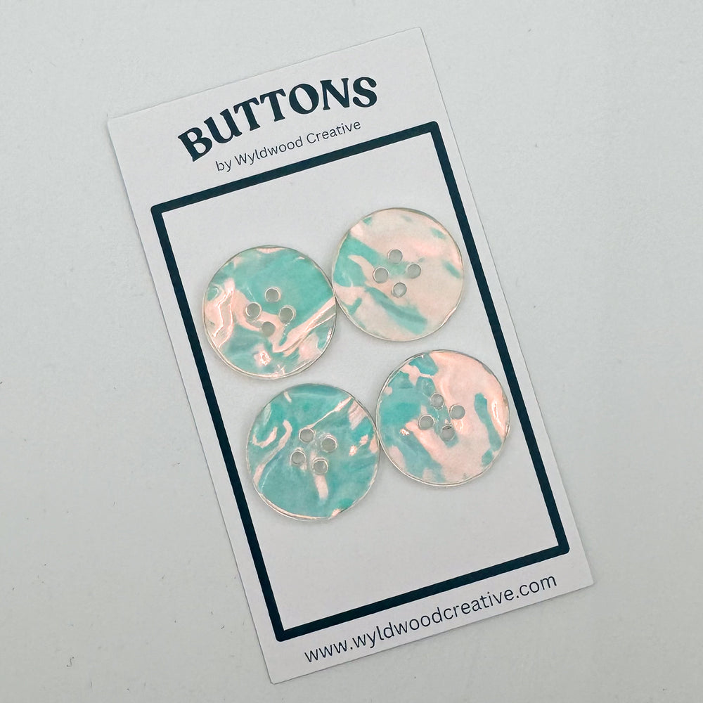 
                      
                        Iridescent Ripple Buttons
                      
                    