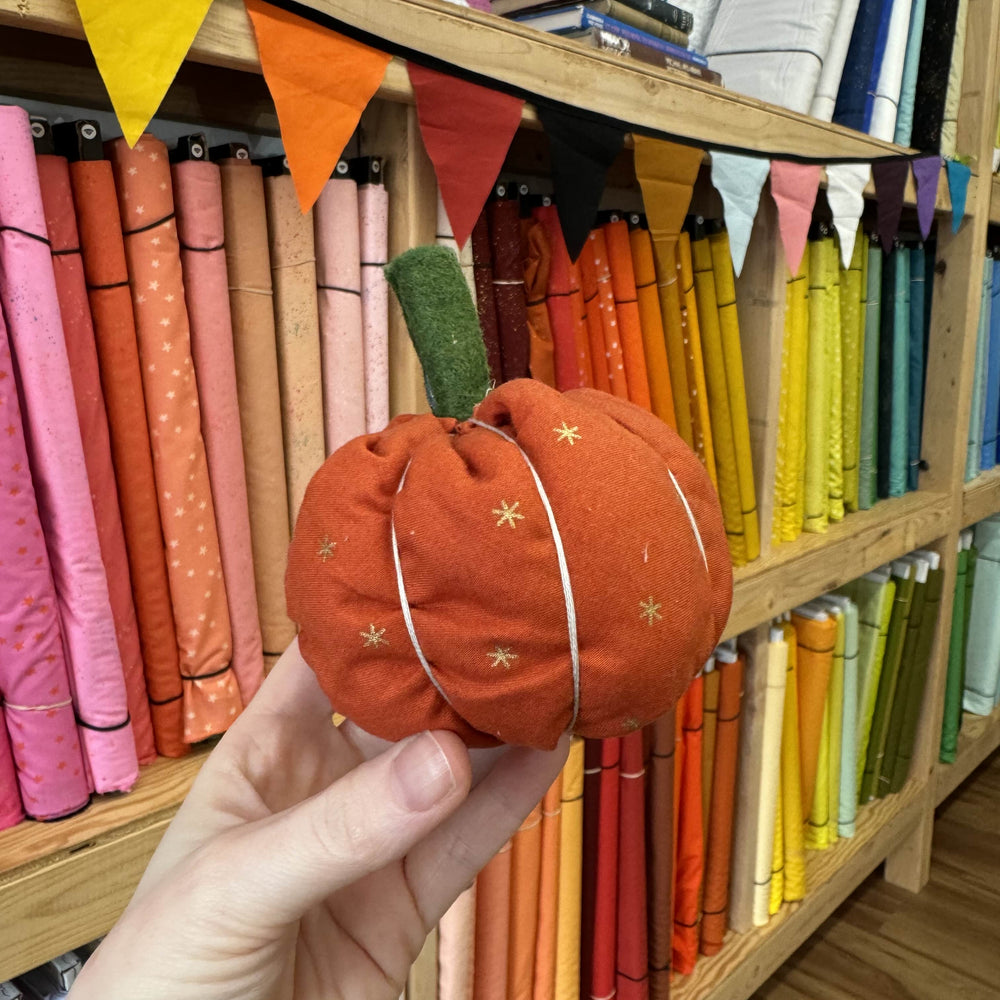 Cute little stuffed fabric pumpkin craft made during Craft Night event at Wyldwood Creative in Renton