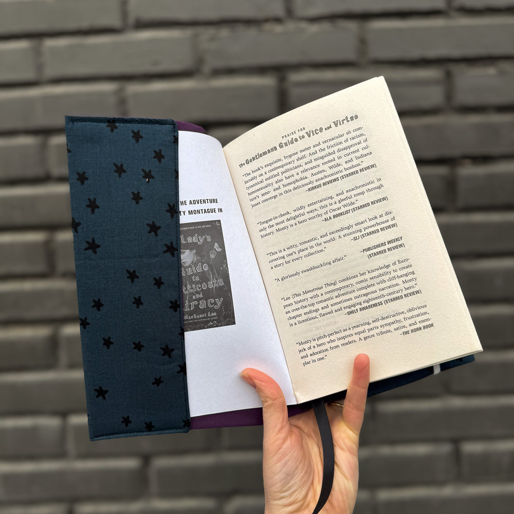 
                      
                        front inside pocket of fabric book cover made from digital pattern by Wyldwood creative 
                      
                    