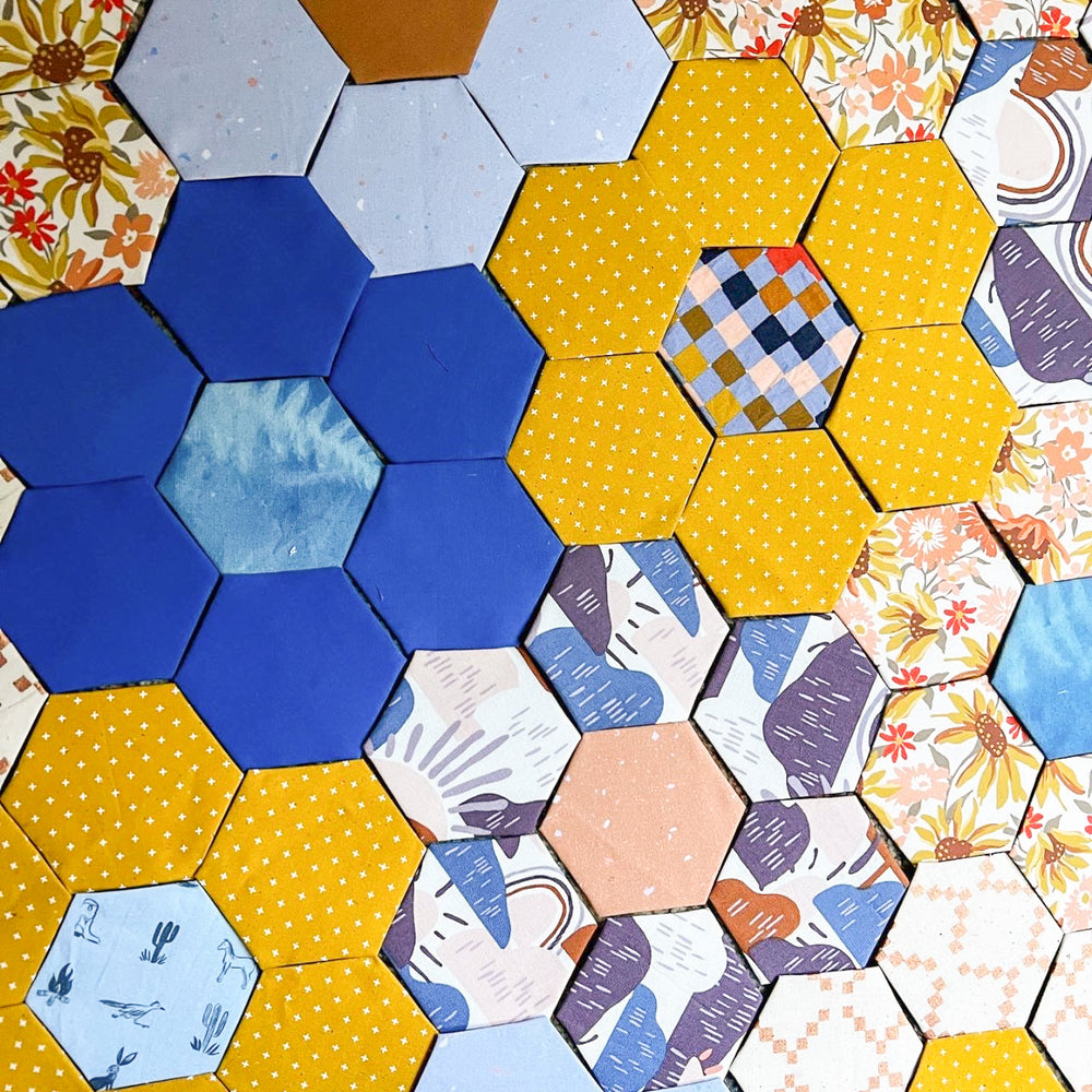 Blue and yellow pattern of hexagon paper folding class at Wyldwood Creative in Renton