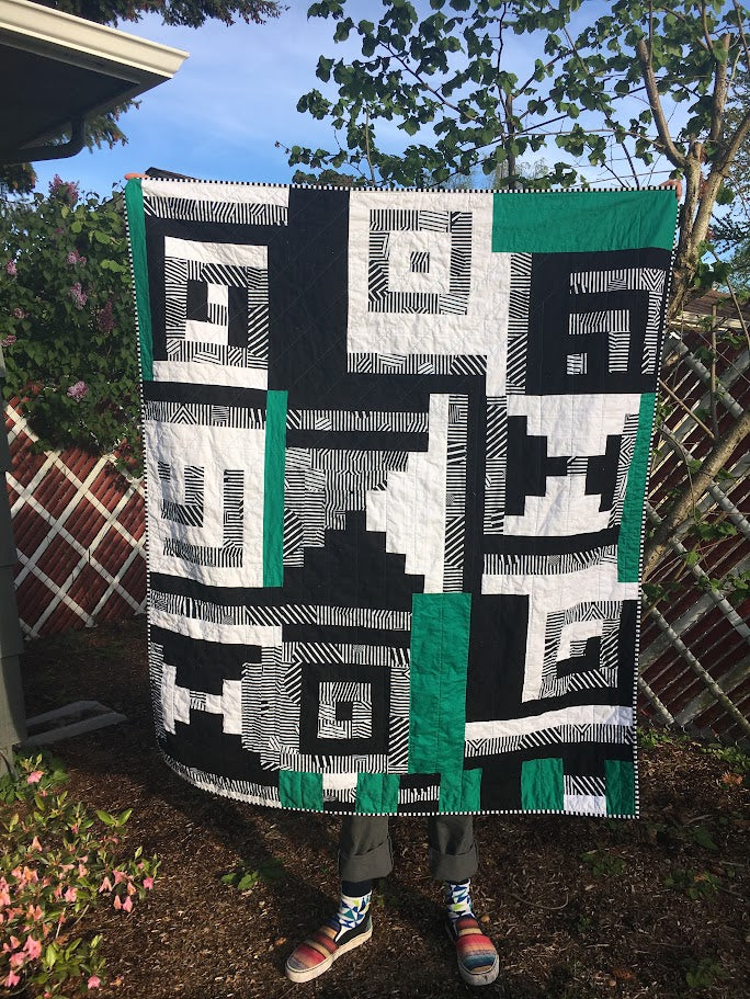 Geometric green, black, and white quilt made in the Improv quilting class at Wyldwood Creative in Renton